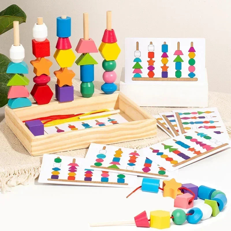 Colorful wooden geometric shape sorting toy set with cards on a neutral background