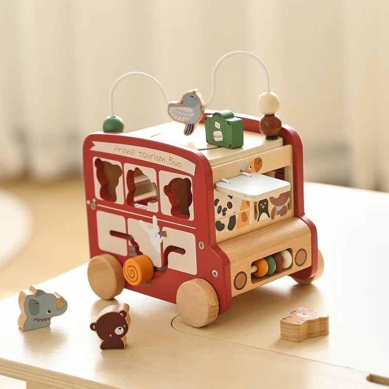 Montessori Activity Cube: Wooden busy bus toy with 8 games. Perfect for babies and toddlers 0-18 months. Durable, educational, and available in 2 color options