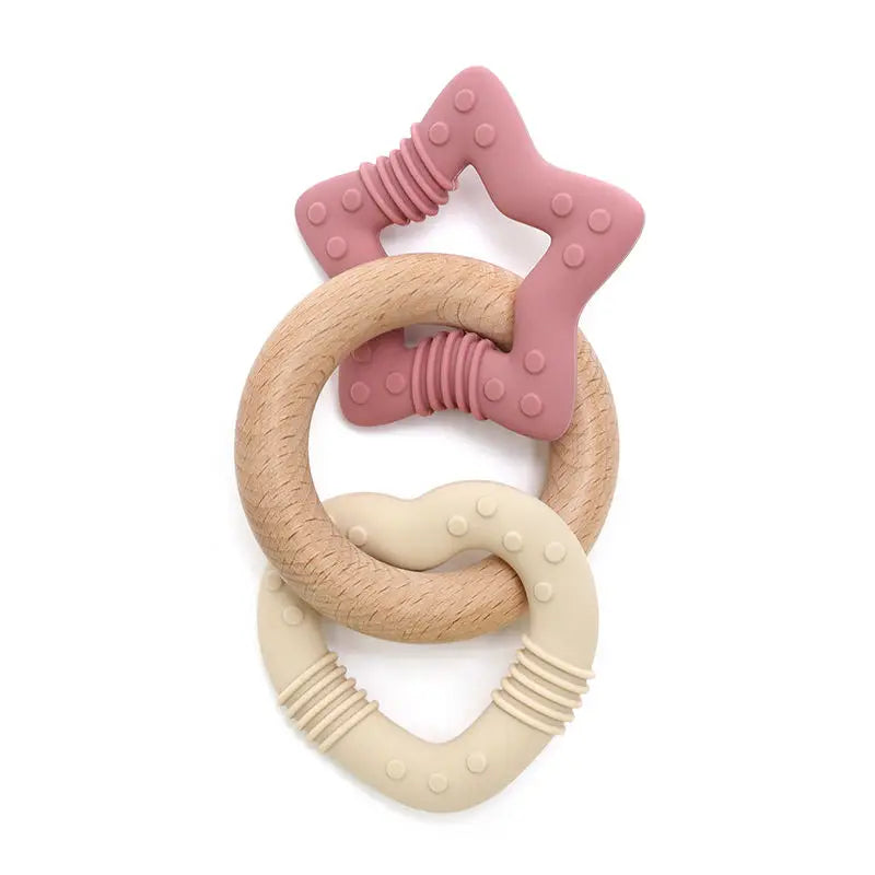 Teething ring with star-shaped handle on a white background