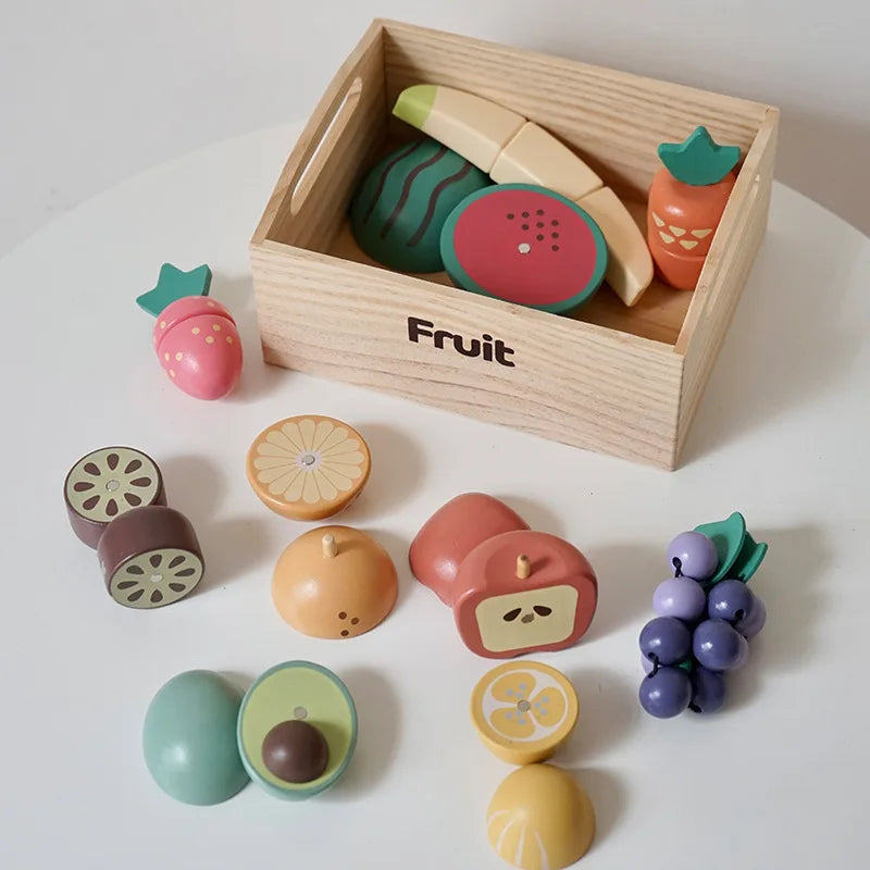 Wooden toy fruit set with a wooden box labeled 'Fruit' on a white background