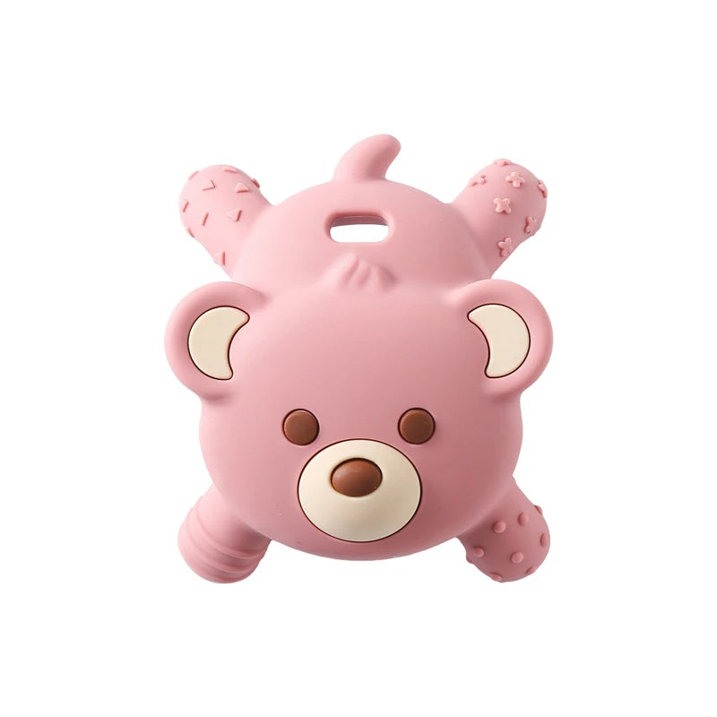 Pink bear-shaped toy on a white background