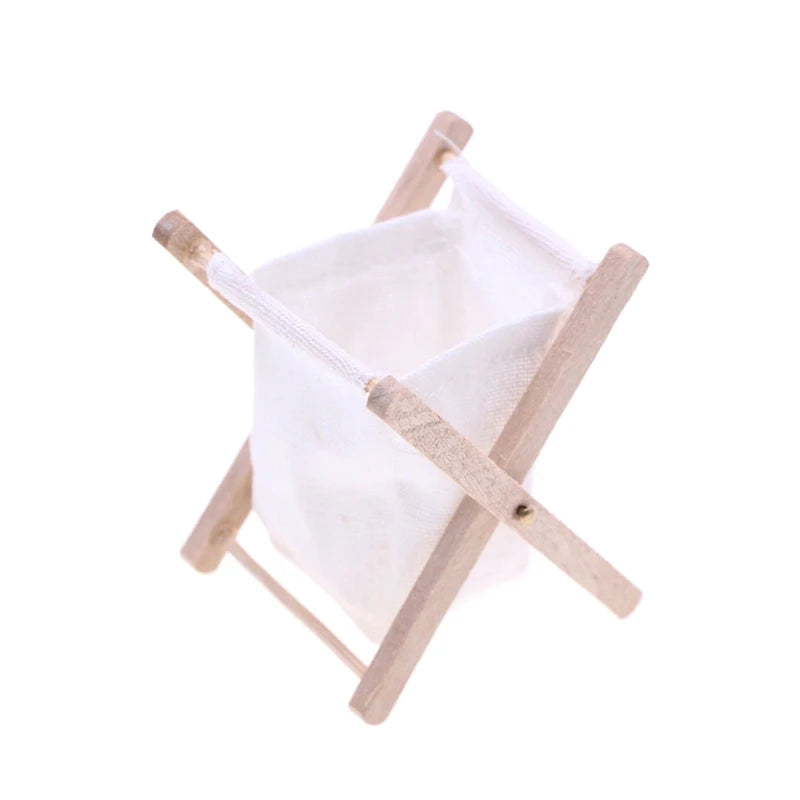 Small wooden stool with a white cushion on a white background