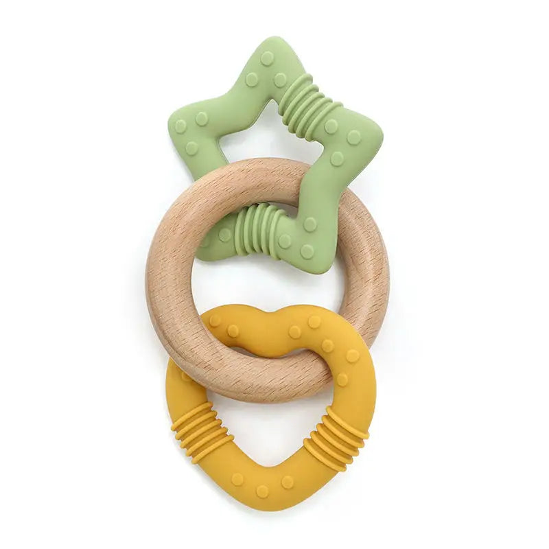Teething ring with wooden and silicone components on a white background