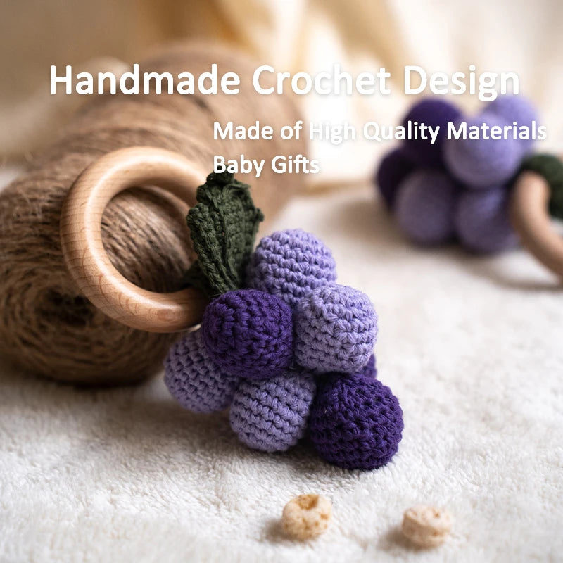 Handmade crochet baby rattle with high-quality materials on a soft surface.