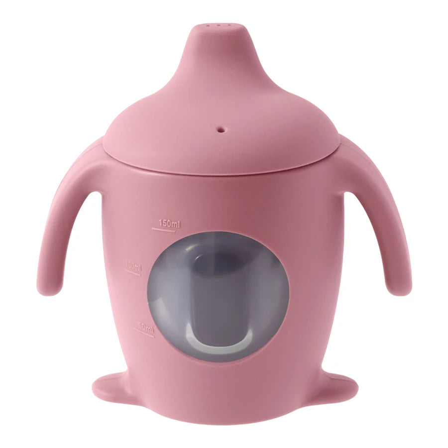 Pink sippy cup with a gray interior on a white background