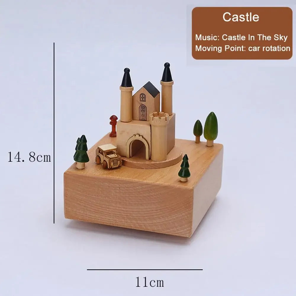 Wooden castle model with trees and a car on a white background, labeled with dimensions and music details. | Oliver & Company Montessori Toys