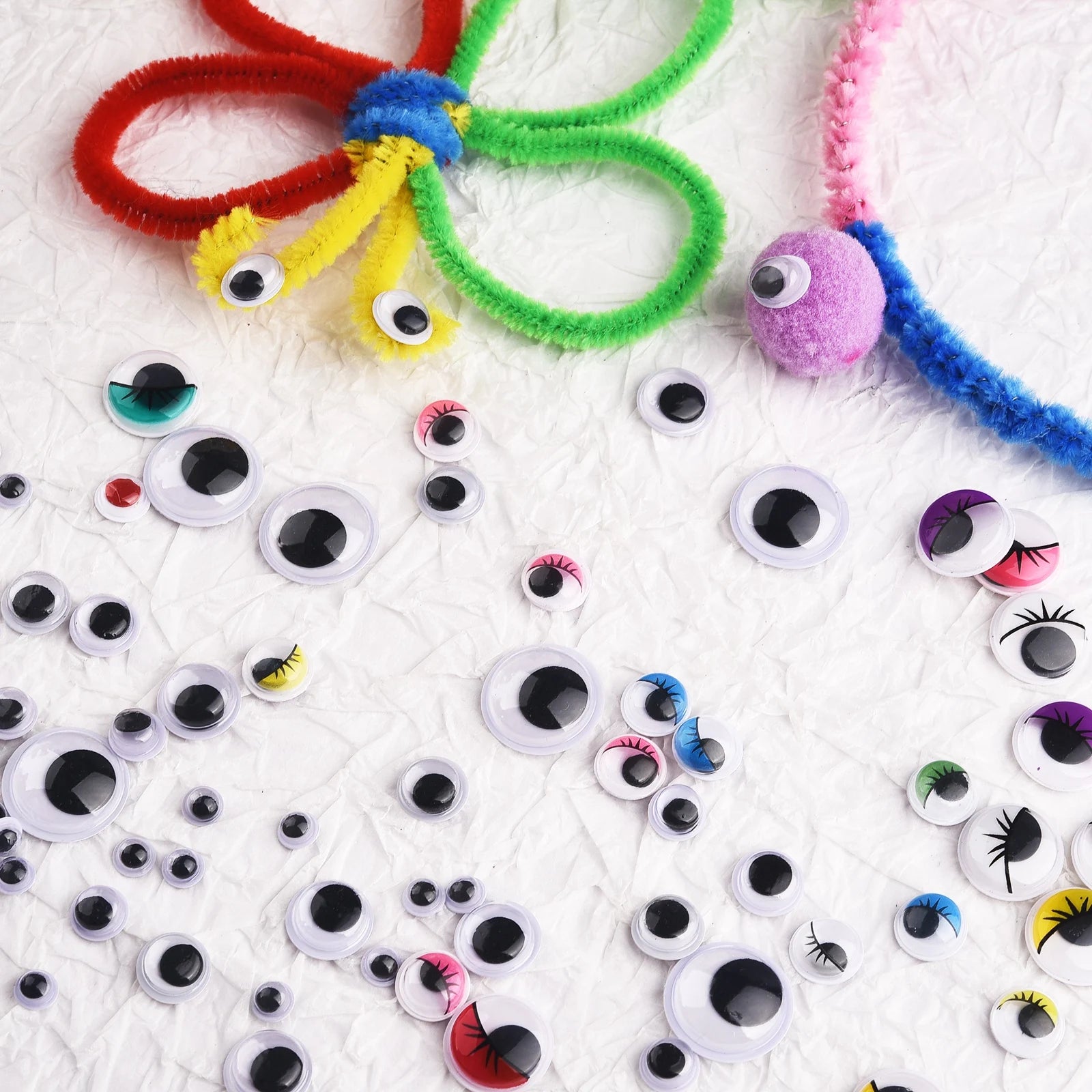 Movable Googly Eyes - Kindergarten Craft Supplies: A variety of colorful, movable eyes for kids' crafts, perfect for enhancing creativity in classroom and home projects.