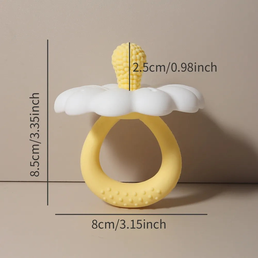 Yellow and white baby teether with measurements on a beige background