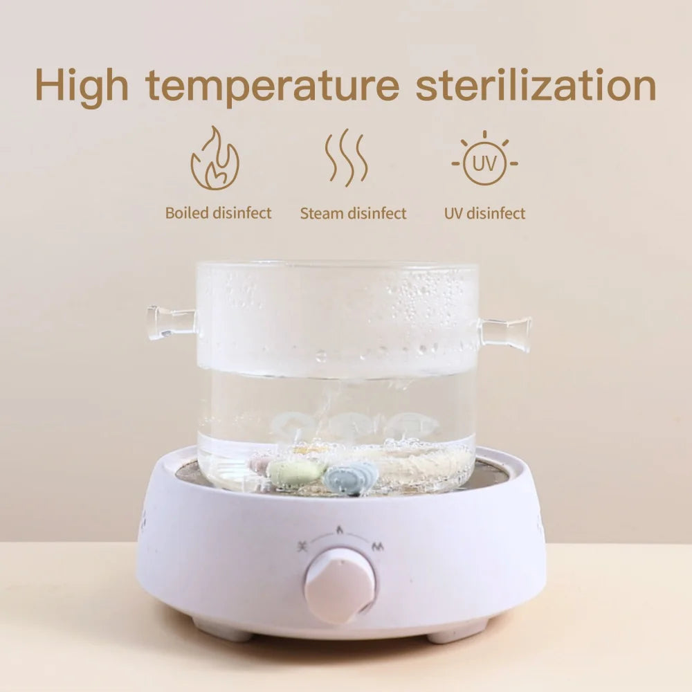 White high temperature sterilization device with clear container on a beige background