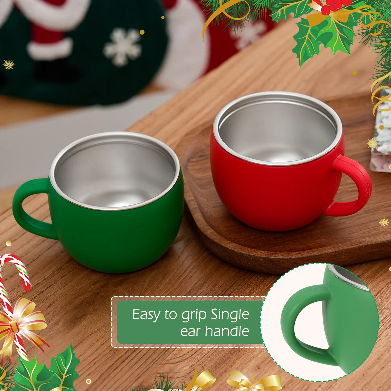 Green and red toddler mugs on a wooden table showing the easy-grip handle