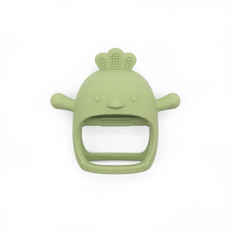 Green baby teether with a smiling face on a white background