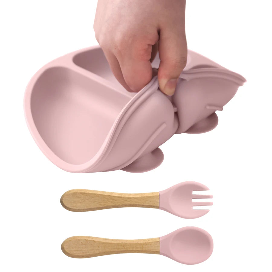 Bending the soft silicone plate with wooden utensils