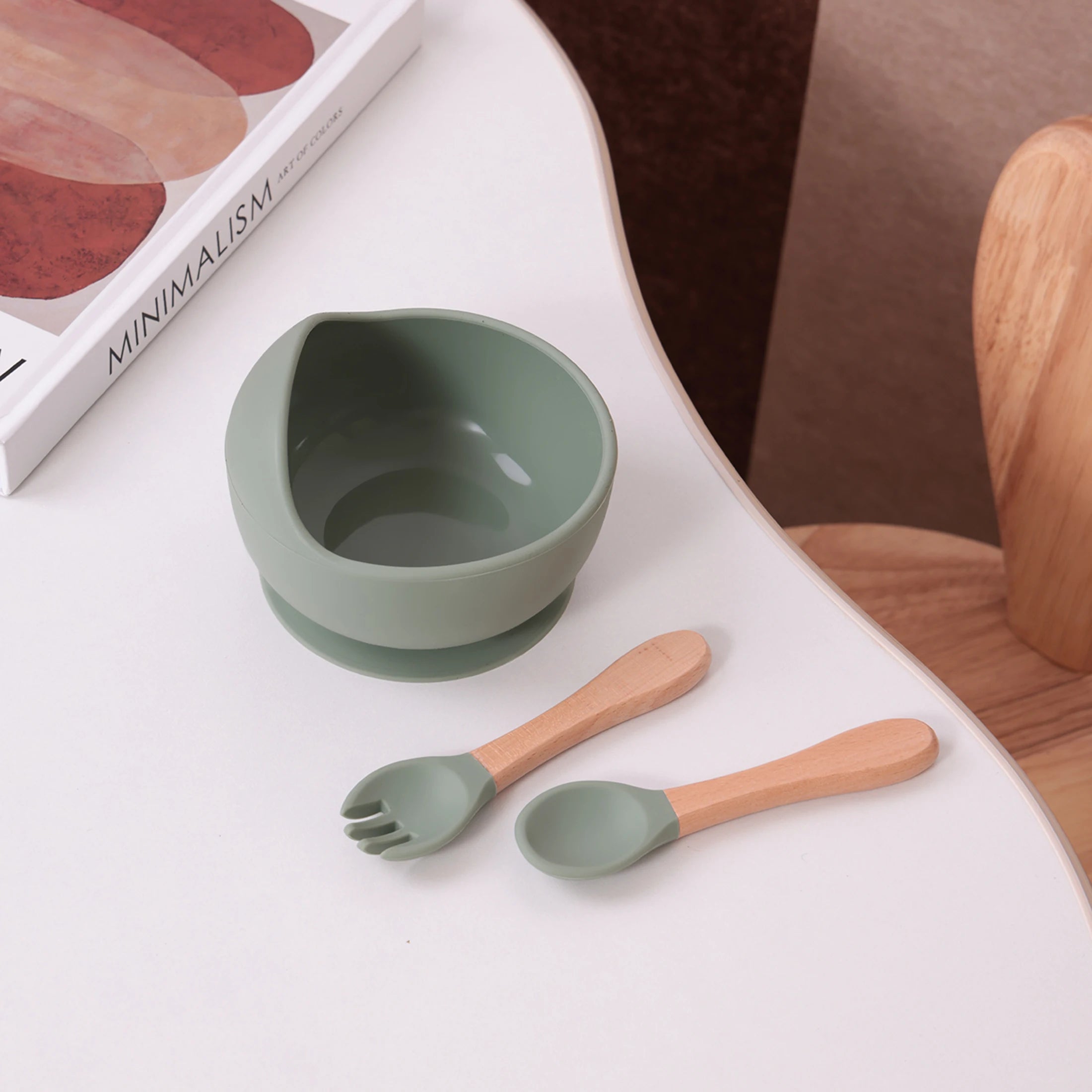 Sage suction bowl with wooden spoon and fork