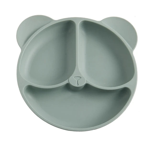 Gray bear-shaped silicone plate on a white background