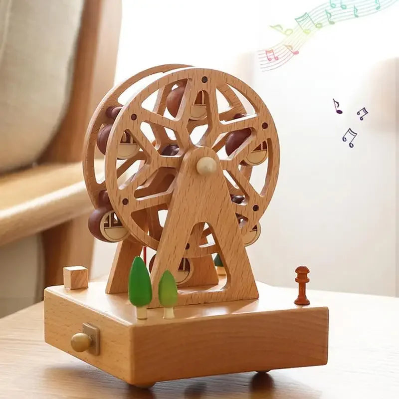 Wooden Ferris wheel music box with musical notes and trees on a light background | Oliver & Company Montessori Toys