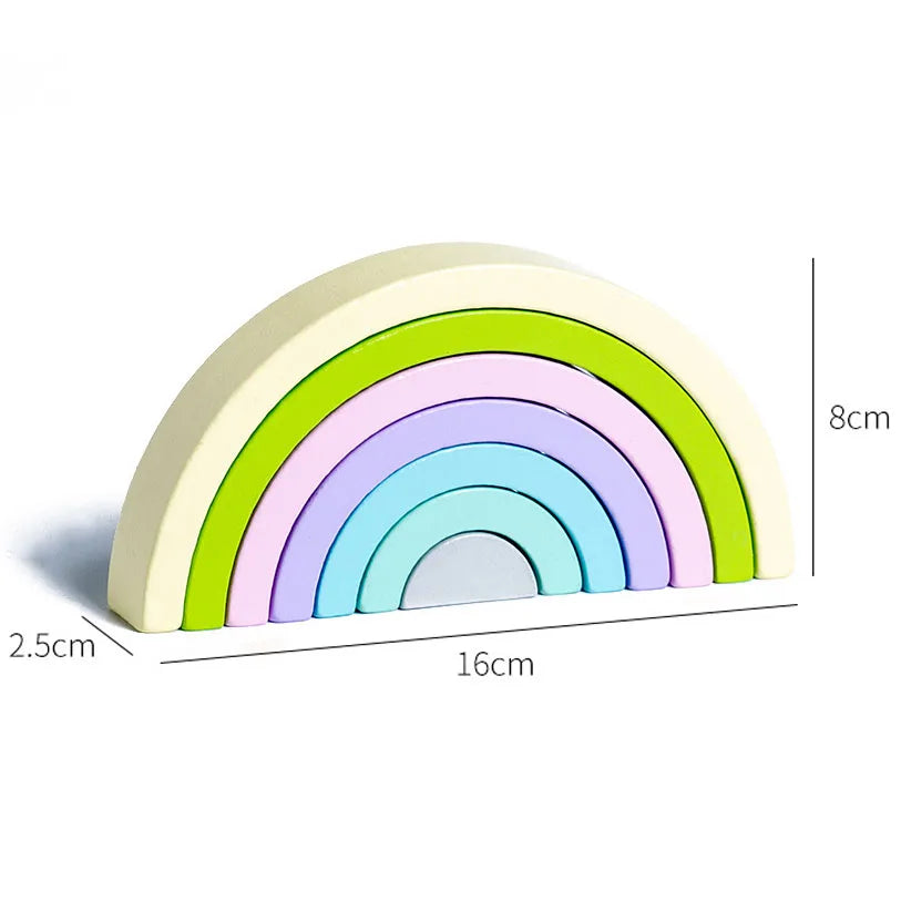 Colorful rainbow-shaped object with measurements on a white background
