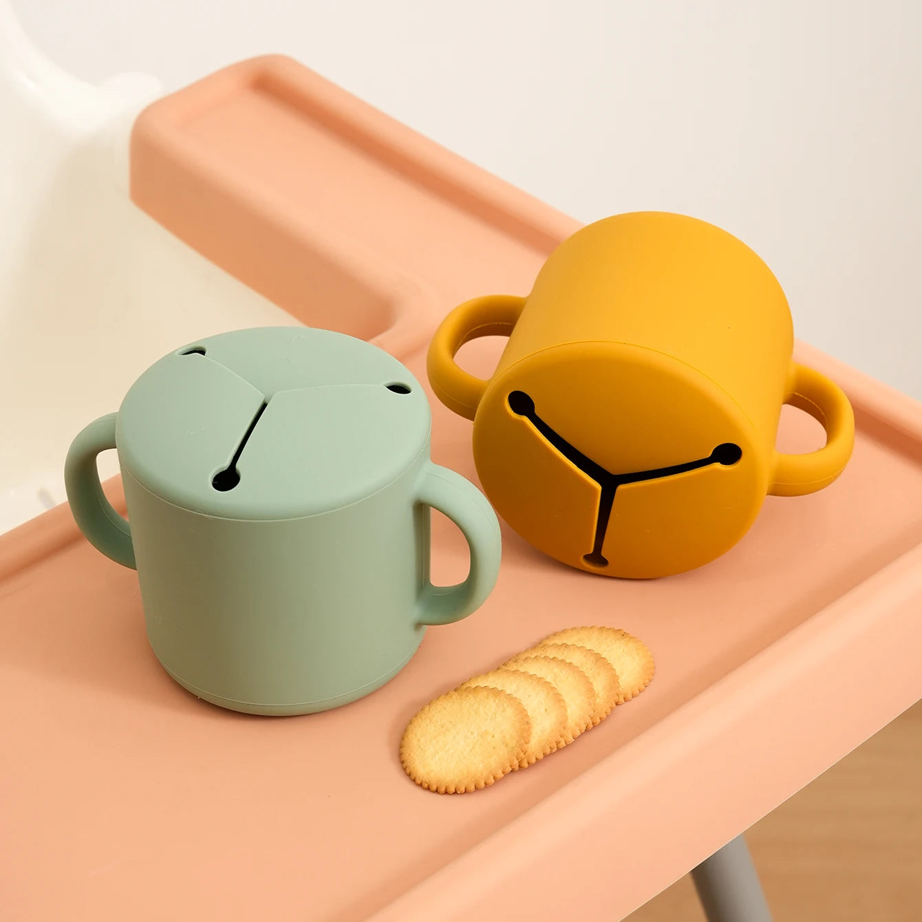 Silicone snack cups with handles on a tray