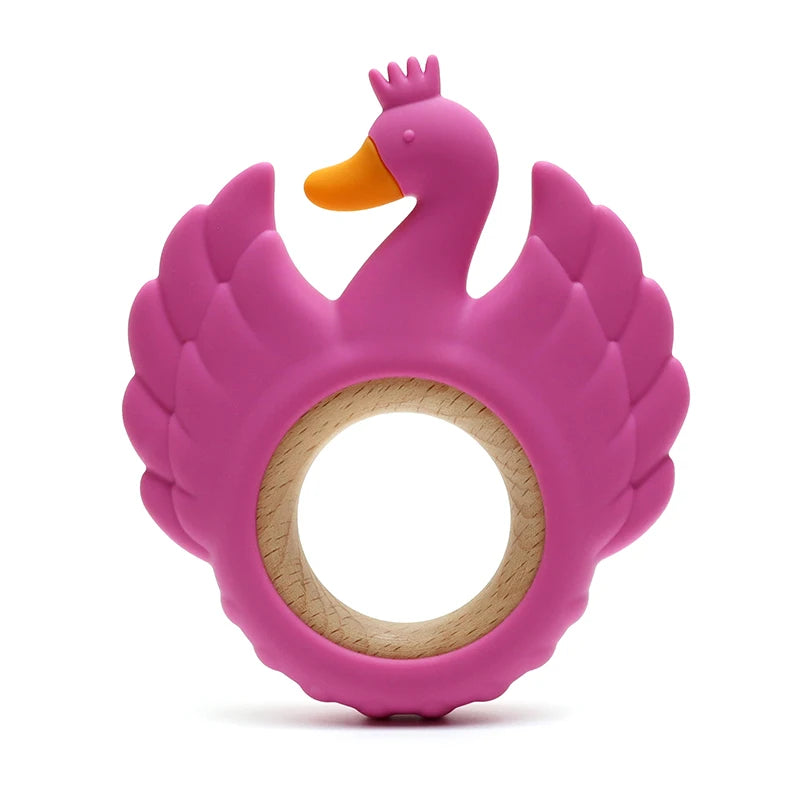 Pink swan-shaped teething ring on a white background