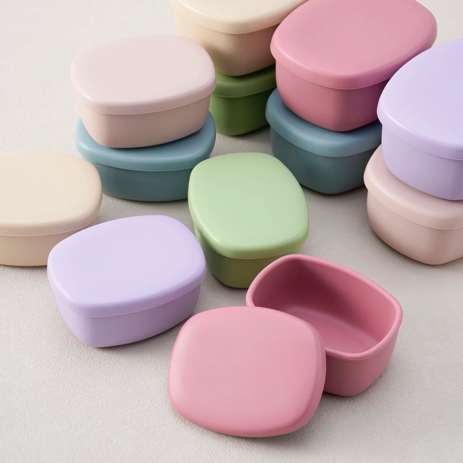 Silicone food storage containers with lids in pastel colors