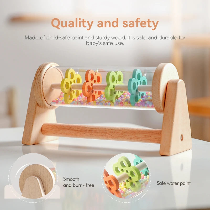 Wooden toy with colorful beads and text about quality and safety on a blurred background