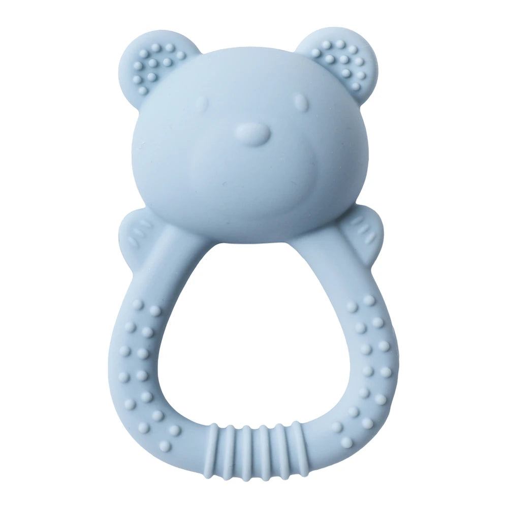 Blue bear-shaped teething ring on a white background
