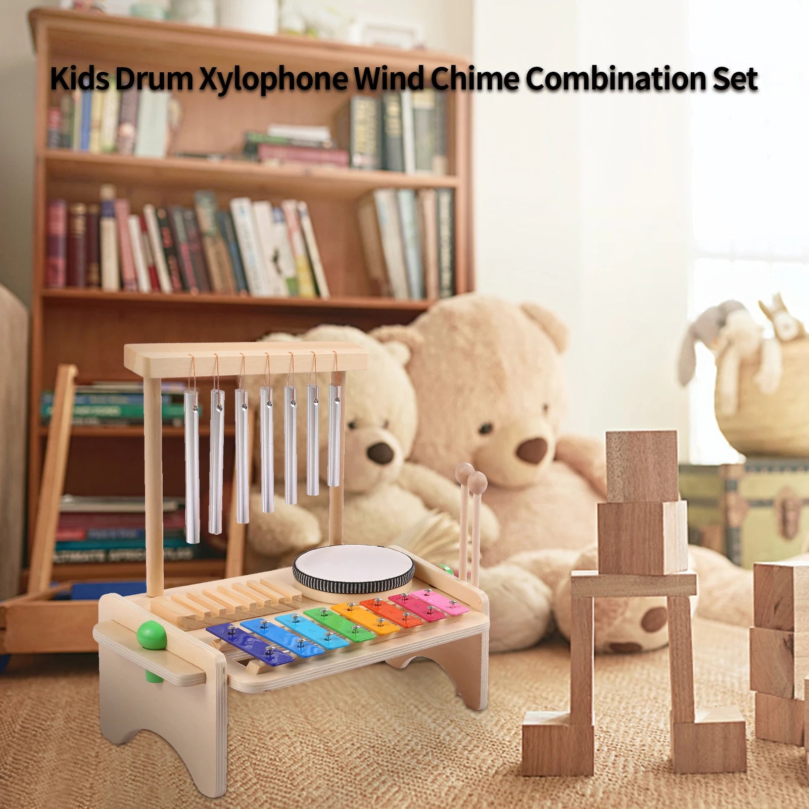 Children's musical toy set including a xylophone, drum, and wind chime in a room with teddy bears and books.