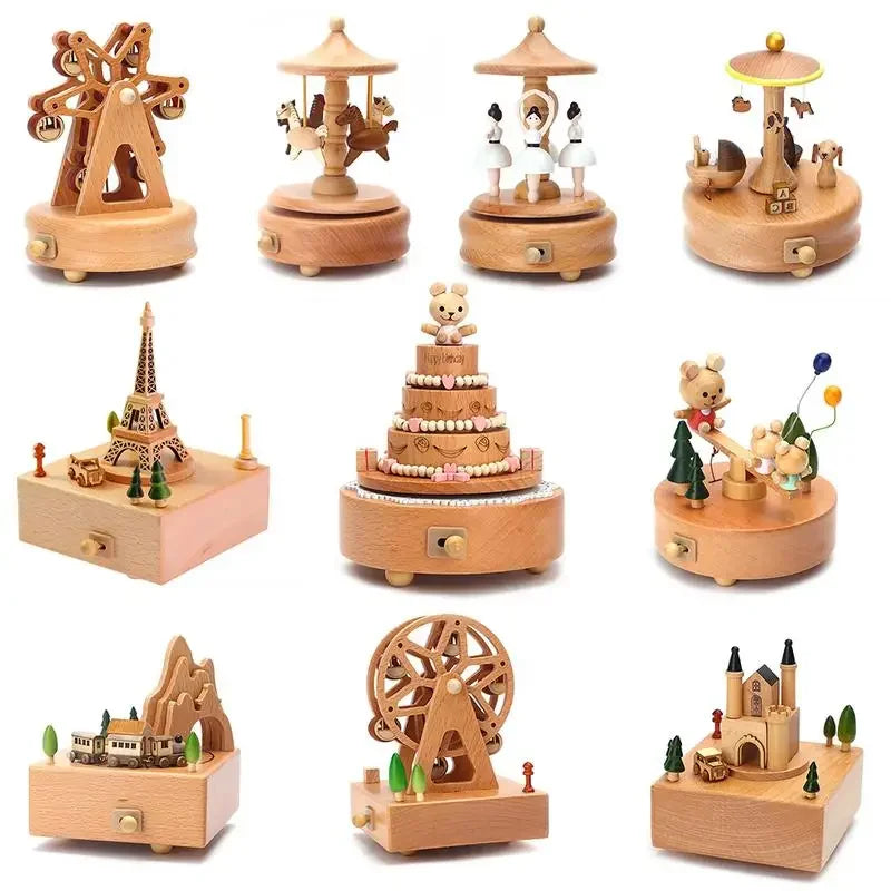 Collection of wooden music boxes with various designs on a white background | Oliver & Company Montessori Toys