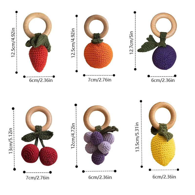 Set of colorful wooden teething rings with measurements on a white background