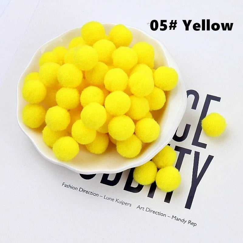 Yellow pom-poms in a white bowl on a white background with text.