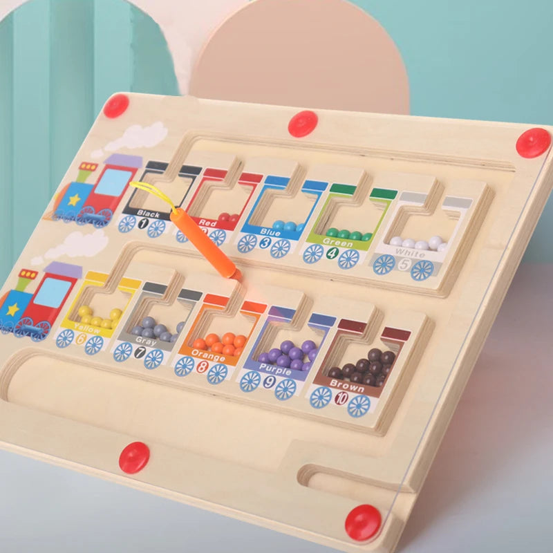 Children's educational toy with a maze and color sorting elements on a light blue background