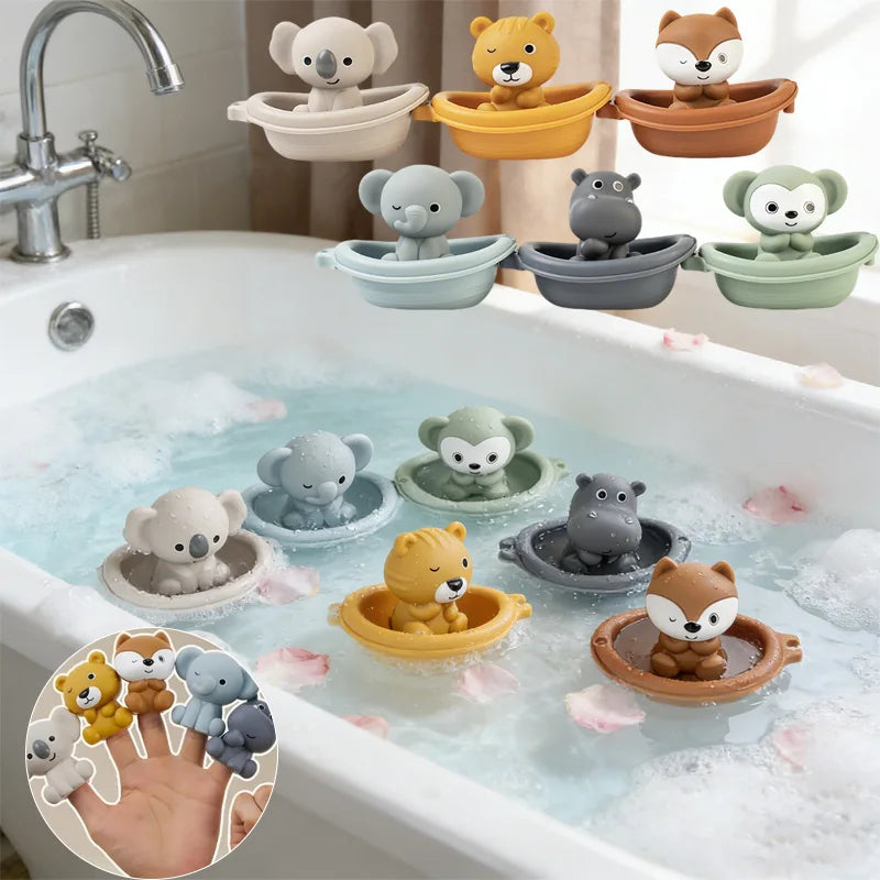 A set of small animal-shaped bath toys floating in a bathtub with bubbles, plus several additional toys arranged above the tub. The toys include koalas, lions, foxes, hippos, and monkeys in different colors, and a circular inset shows some toys being worn on fingers.