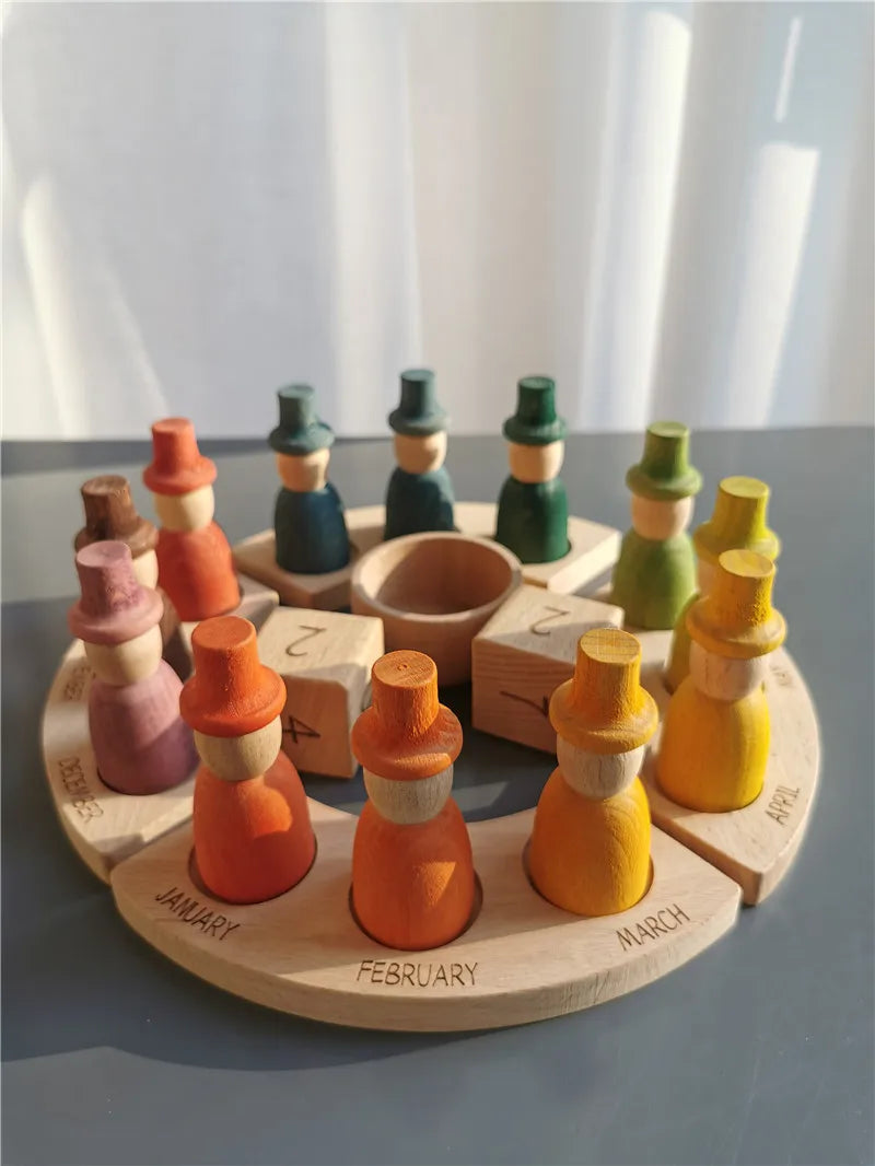 Wooden calendar toy with colorful blocks on a light surface