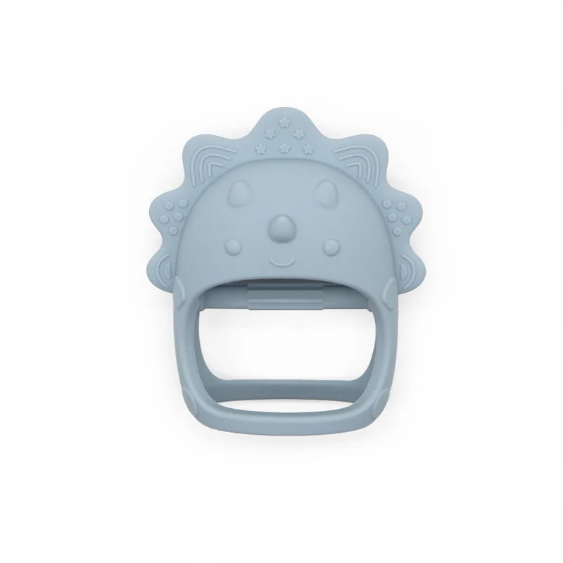 Blue dinosaur-shaped teething ring on a white background