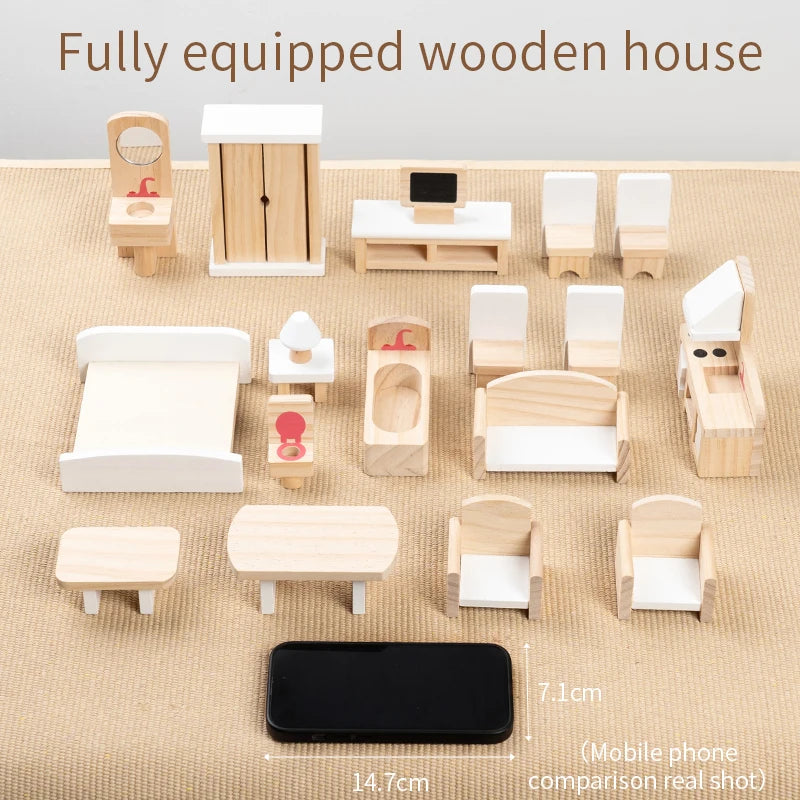 Set of miniature wooden furniture pieces on a beige surface with a phone for scale.