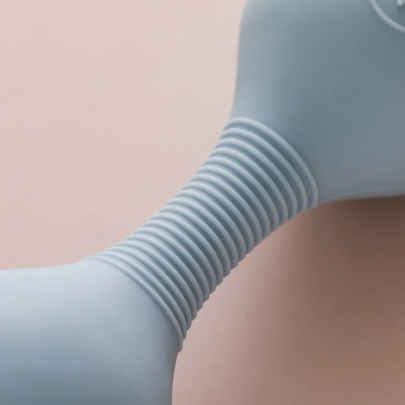 Close-up of a blue rubber glove on a beige background