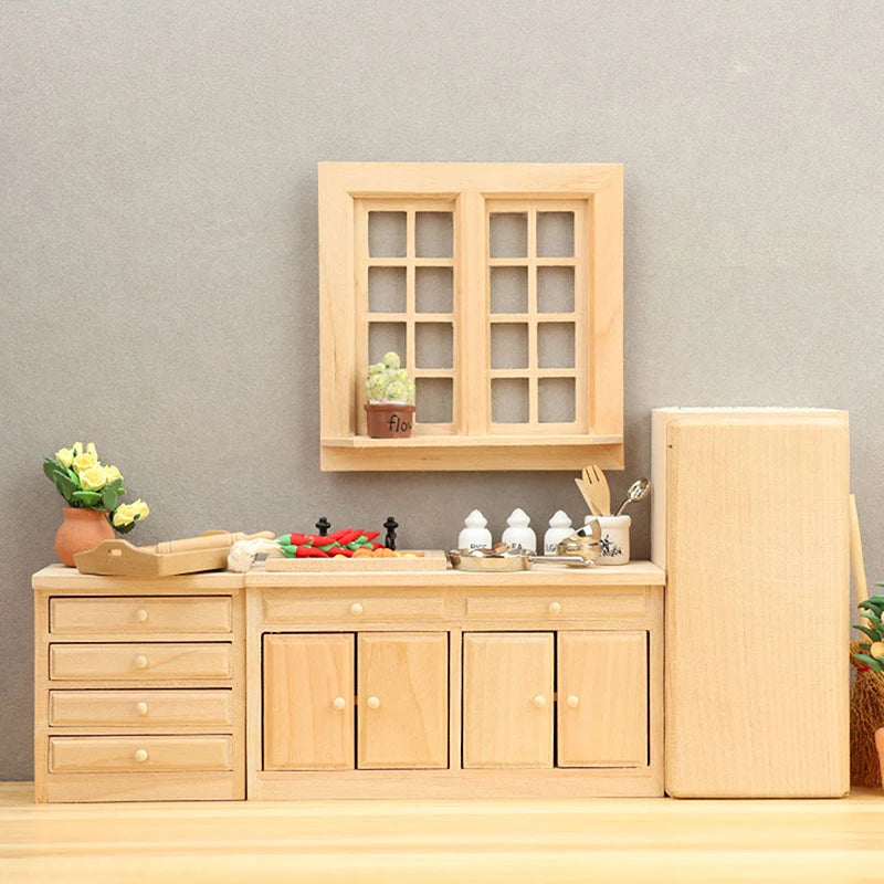 Wooden kitchen set with cabinets, drawers, and a refrigerator against a gray wall.
