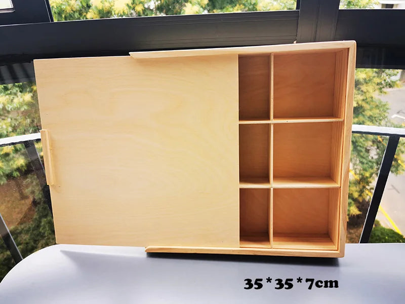 Wooden storage unit with sliding door on a white surface, with dimensions displayed.
