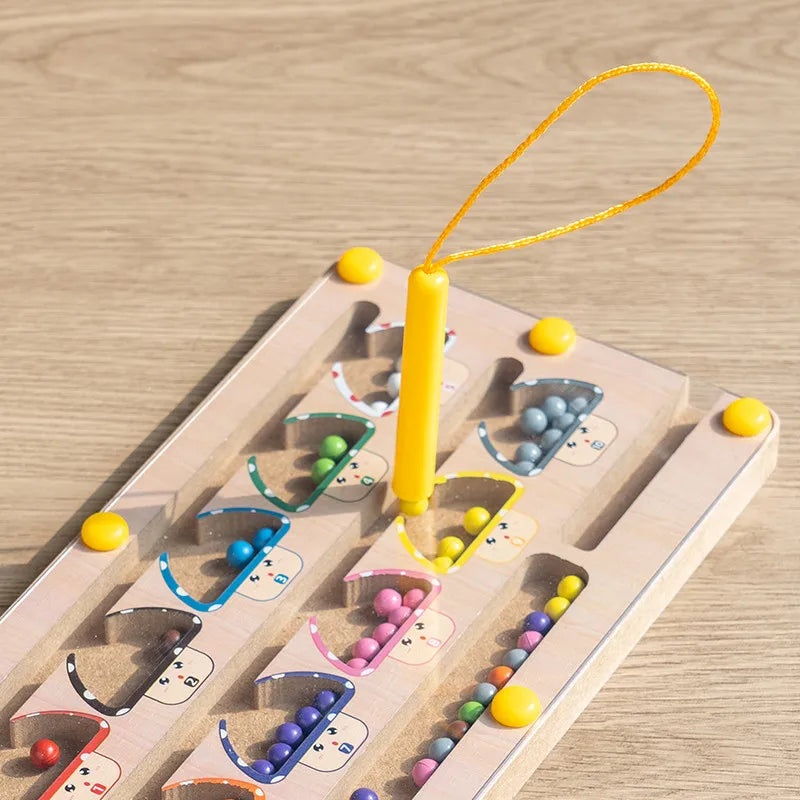 Wooden pegboard toy with colorful beads on a wooden surface