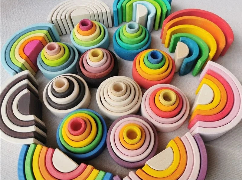 Colorful wooden toy set on a light gray background