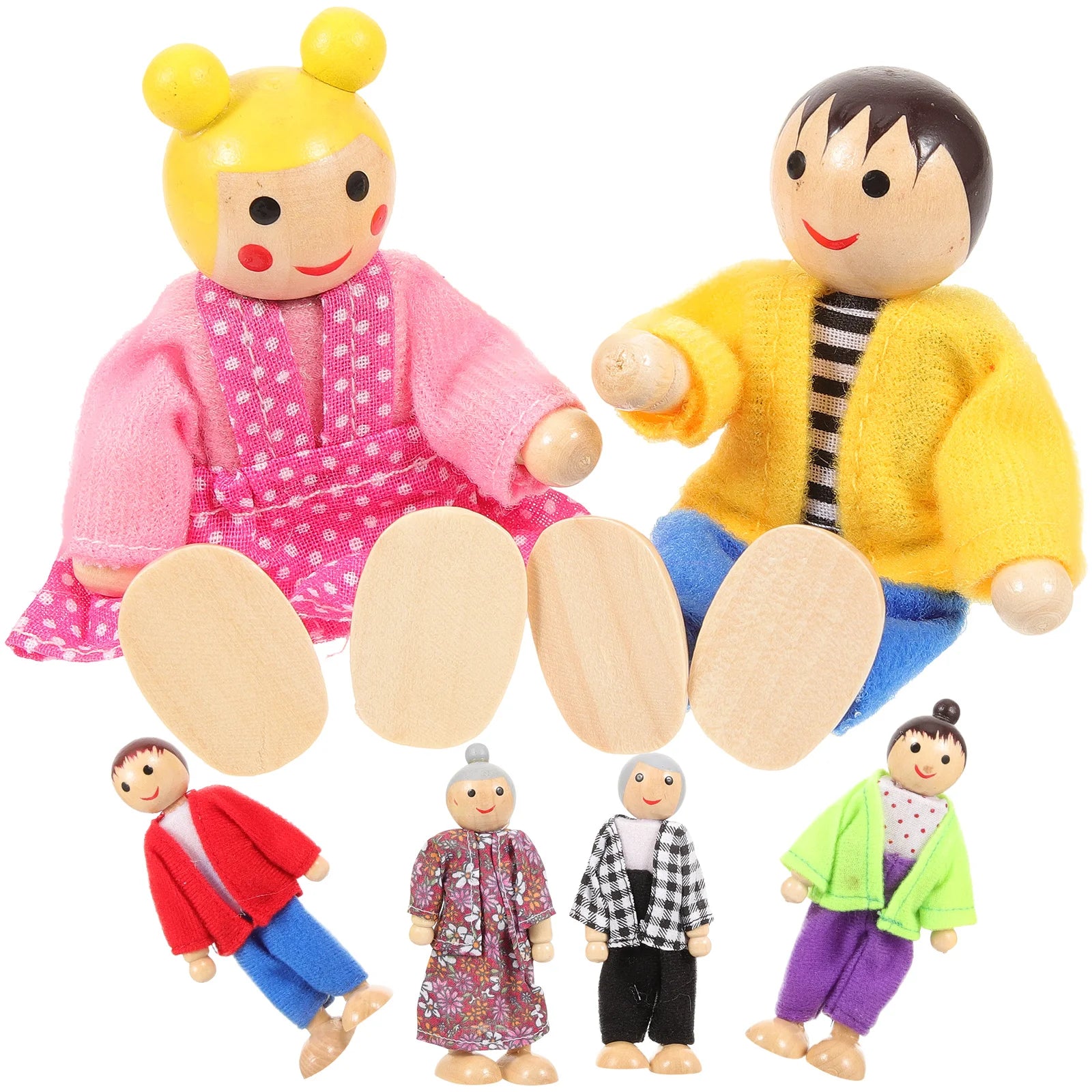 Set of wooden dolls with different outfits on a white background