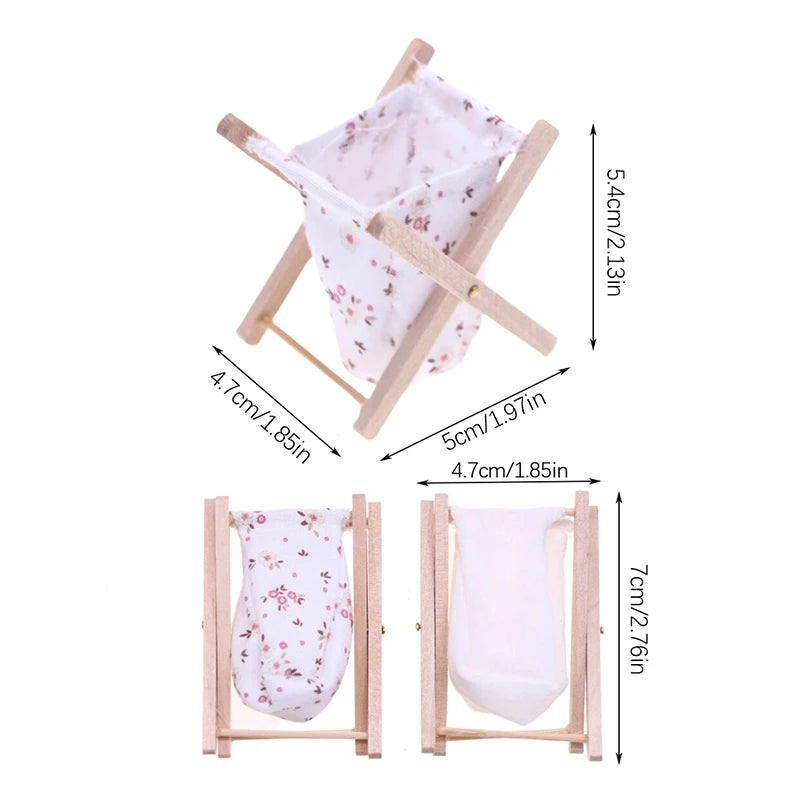 Wooden baby bassinet with floral bedding and dimensions displayed.