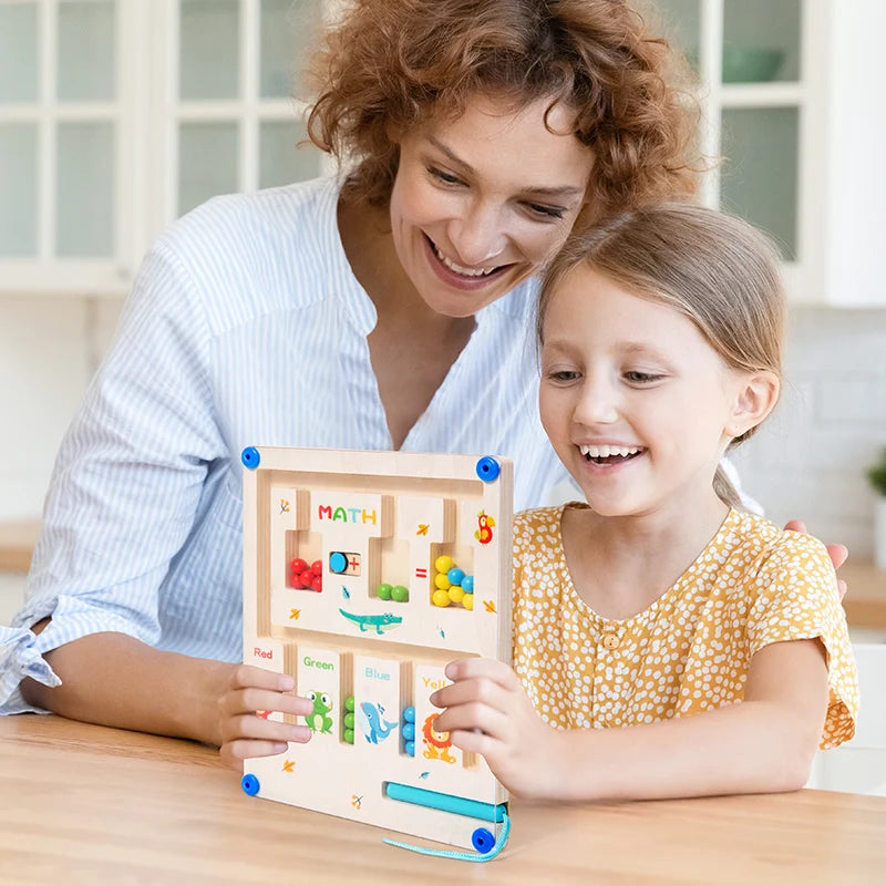 Woman and child playing with a colorful wooden puzzle