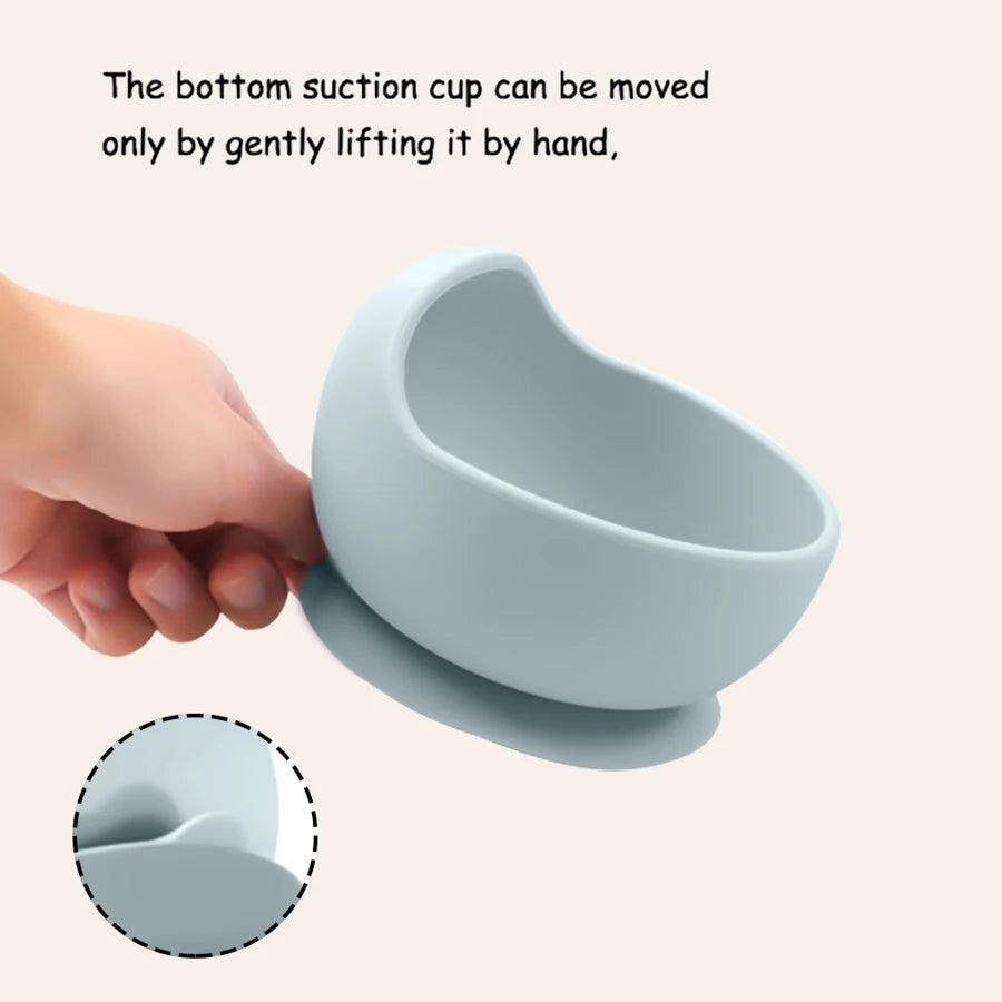 Lifting the suction tab to release the bowl