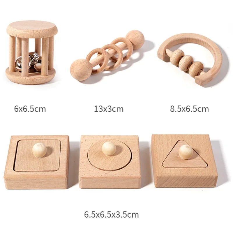 Set of wooden baby toys with measurements on a white background