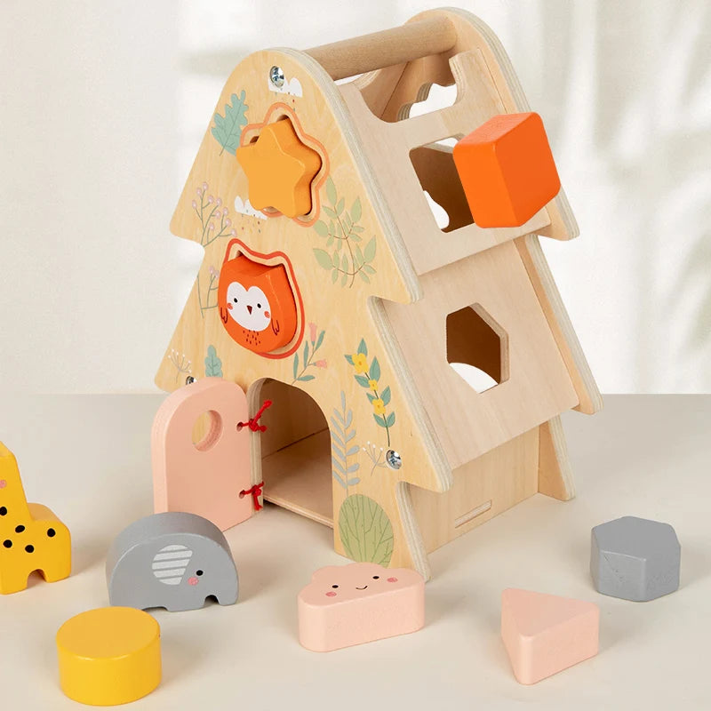 Wooden toy with animal faces and geometric shapes on a light background