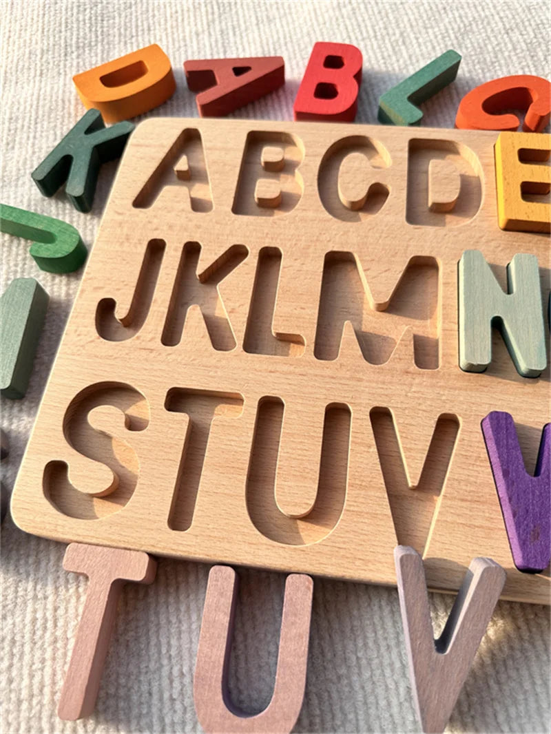 Wooden alphabet letters with colorful wooden letters on a textured surface