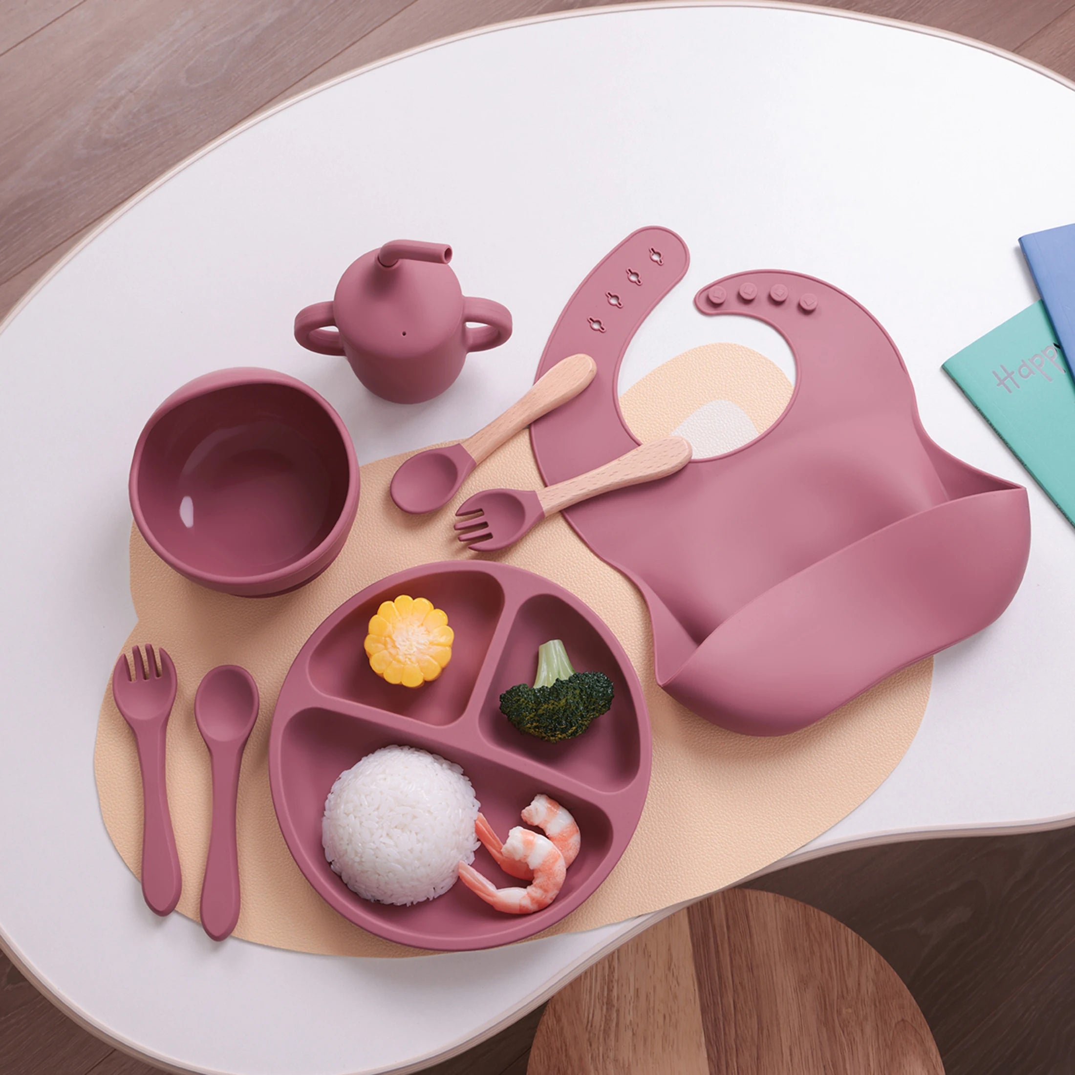 Dusty rose feeding set with food on the plate