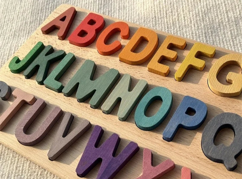 Colorful wooden letters on a wooden board