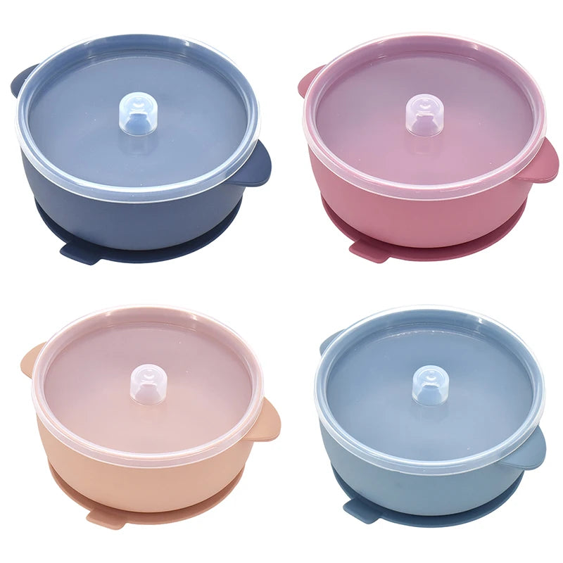 Silicone suction bowls with clear lids in navy, rose, peach and blue