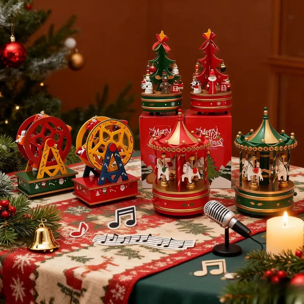 Collection of Christmas-themed musical boxes on a festive tablecloth with a microphone and candle.
